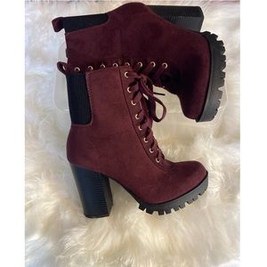 Burgundy and black string up ankle boot heels with small platform, size 7.